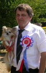 Photo of Mr W Heap holding Best Vet-
eran, Champion and Irish Champion
Toodulpips Dark Warrior at Madrako.